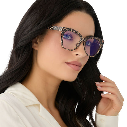 on model - female wearing diff eyewear featuring the willa square blue light readers with a leopard tortoise frame angled view