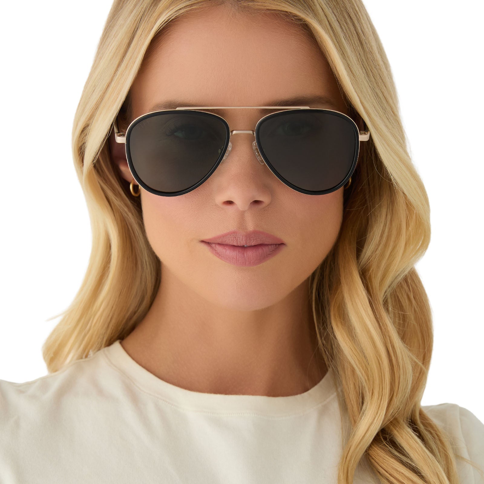 on model - female wearing yellowstone x diff eyewear featuring the yellowstone aviator sunglasses with a black frame and g15 polarized lenses front view