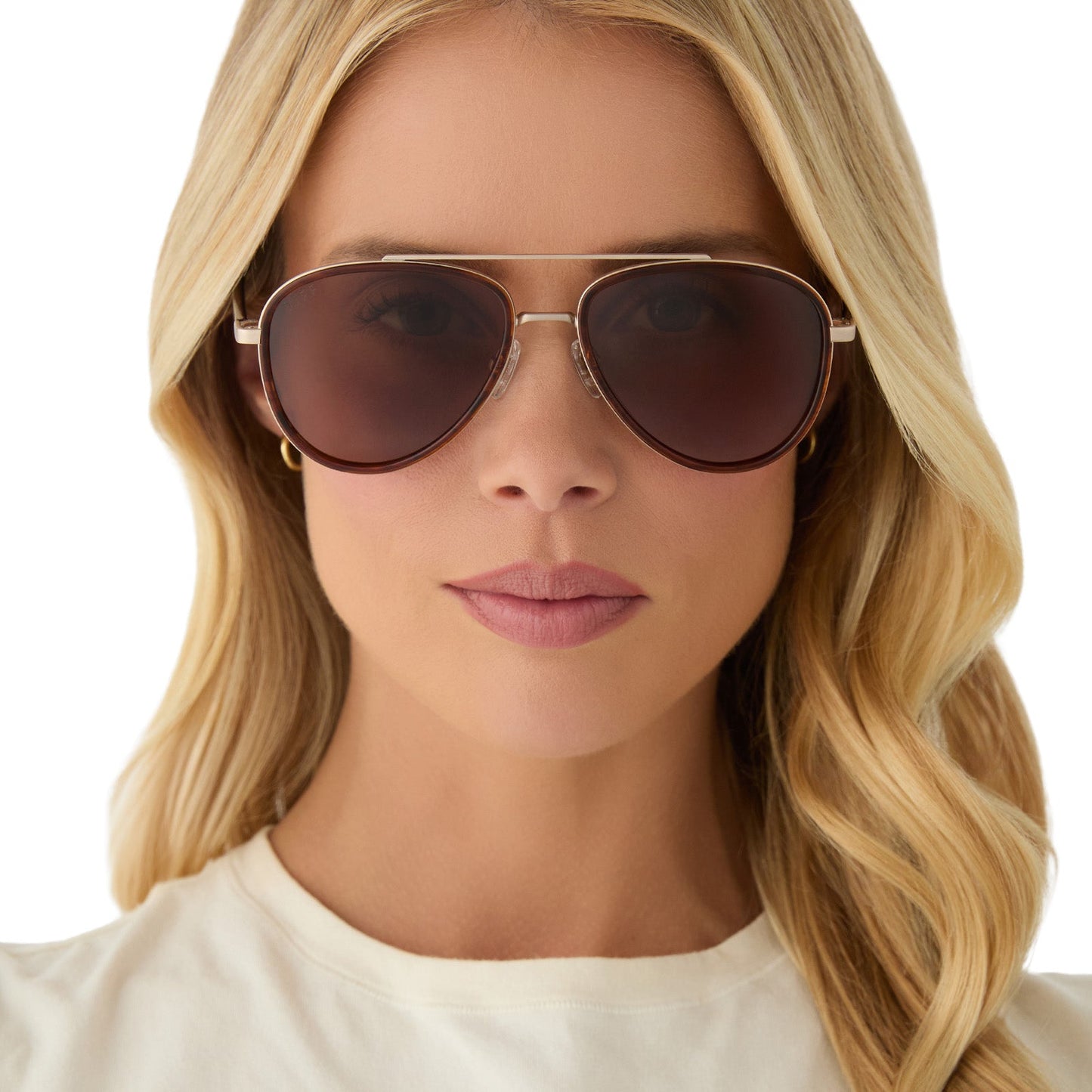 on model - female wearing yellowstone x diff eyewear featuring the yellowstone aviator sunglasses with a sequoia tortoise frame and brown polarized lenses front view