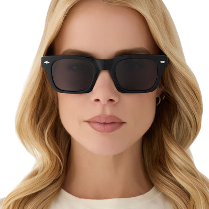 on model - female wearing yellowstone x diff eyewear featuring the kayce dutton square sunglasses with a classic black acetate frame and grey polarized lenses front view