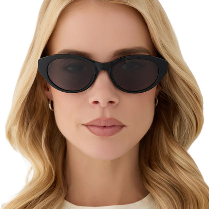 on model - blonde female wearing yellowstone x diff eyewear featuring the teeter round sunglasses with a classic black acetate frame and grey polarized lenses front view