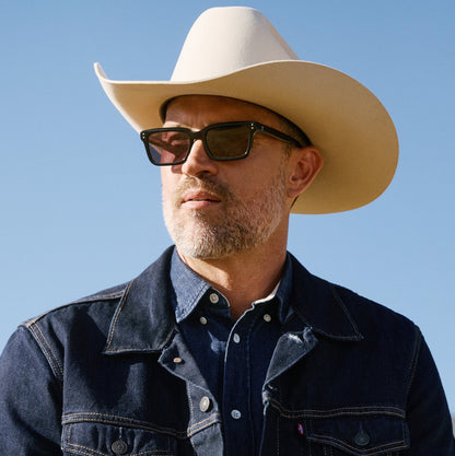 lifestyle - male wearing diff eyewear yellowstone john dutton sunglasses black & grey front view