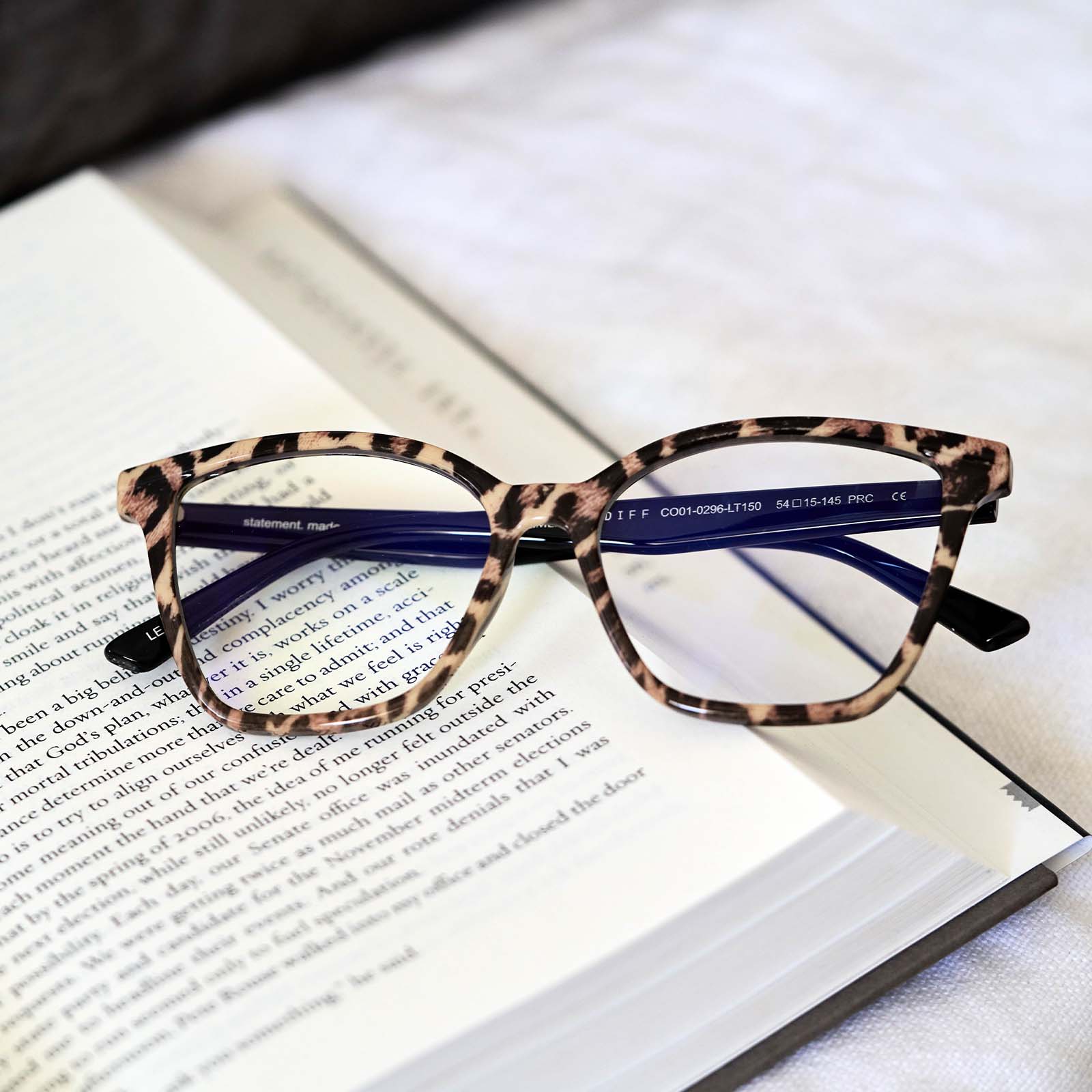 LEAH - LEOPARD TORTOISE + BLUE LIGHT READERS flatlay