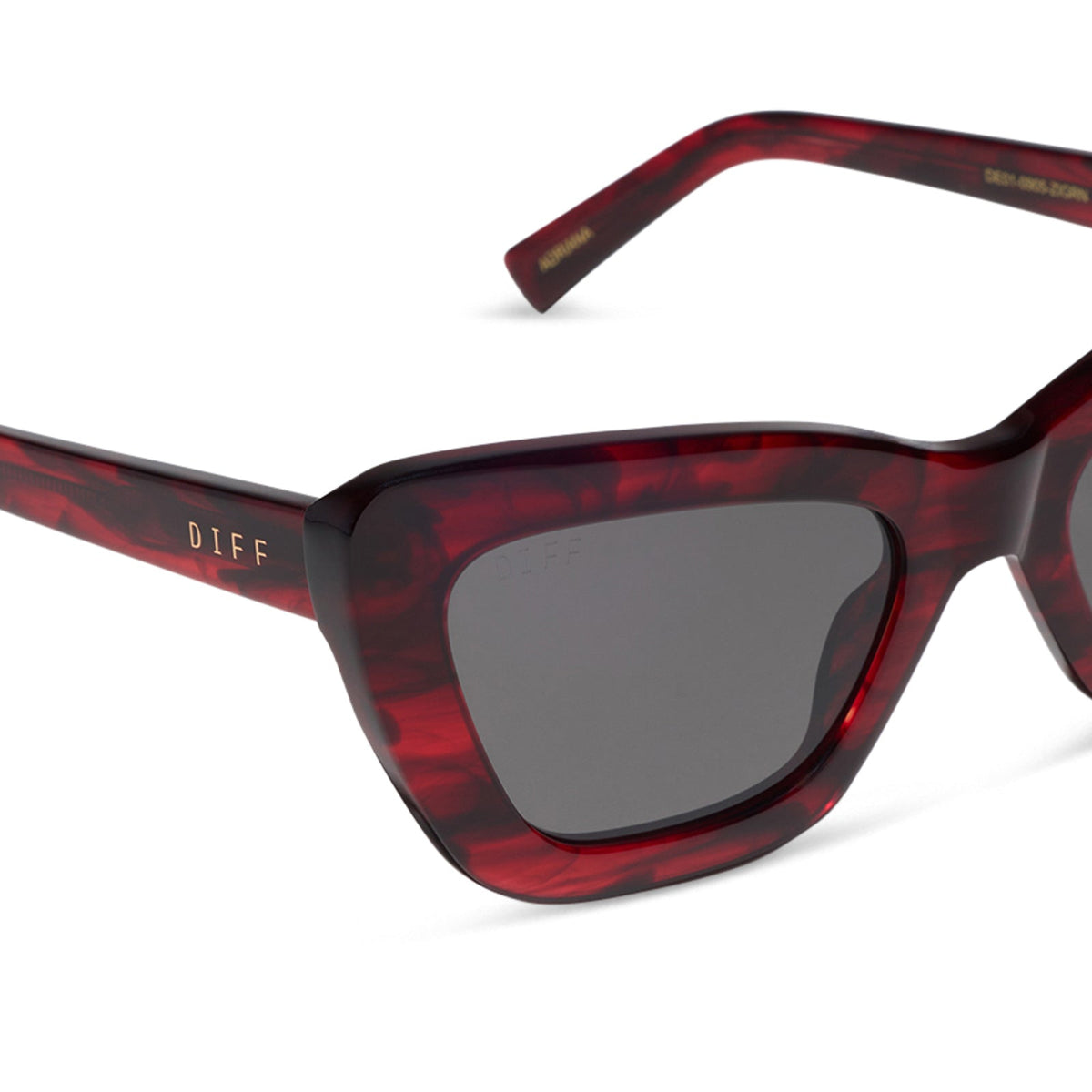 diff eyewear featuring the adriana cateye sunglasses with a rich red tortoise frame and grey lenses detailed view