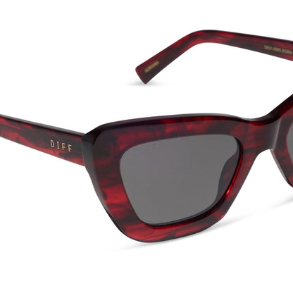 diff eyewear featuring the adriana cateye sunglasses with a rich red tortoise frame and grey lenses detailed view