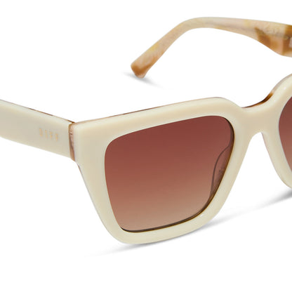 diff eyewear featuring the amara square sunglasses with a courtside ivory outside with gilded tortoise inside the frame and brown gradient polarized lenses detailed view