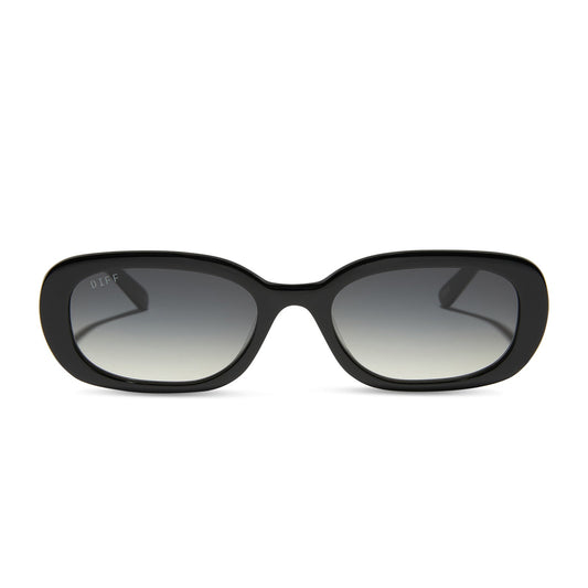 aspyn ovard x diff eyewear featuring the cove oval sunglasses with a black frame and grey gradient lenses front view