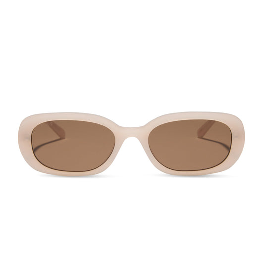 aspyn ovard x diff eyewear featuring the cove oval sunglasses with a milky blush frame and brown lenses front view