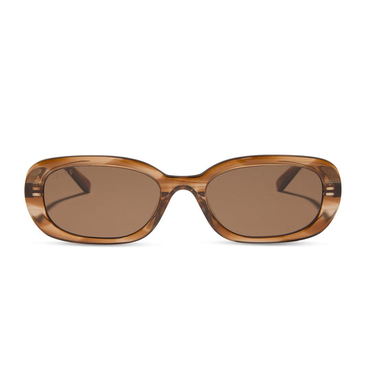 aspyn ovard x diff eyewear featuring the cove oval prescription sunglasses with a tortoise frame front view