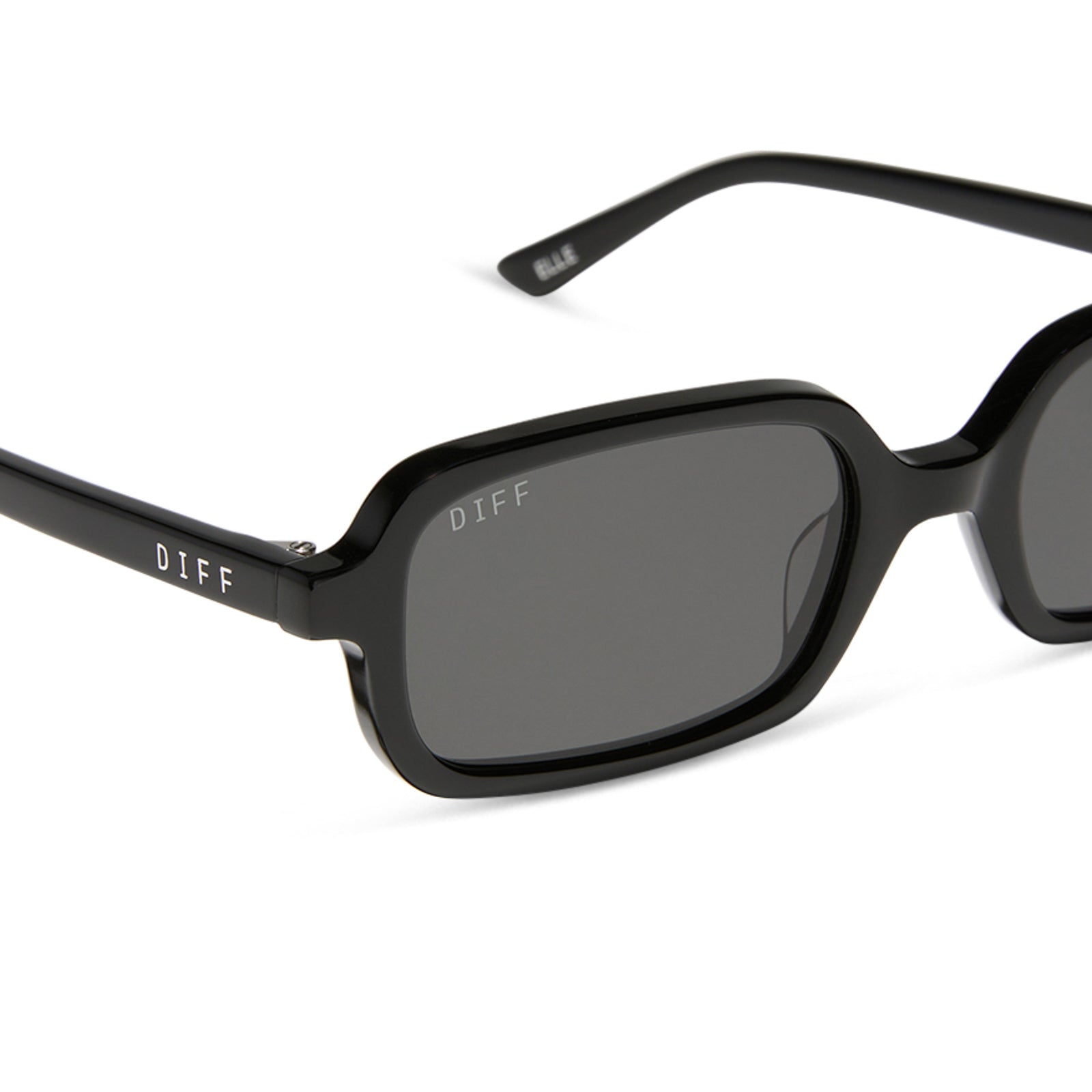 aspyn ovard x diff eyewear featuring the elle rectangle sunglasses with a black frame and grey lenses detailed view