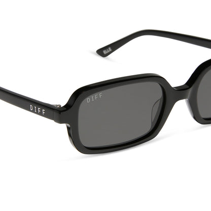 aspyn ovard x diff eyewear featuring the elle rectangle sunglasses with a black frame and grey lenses detailed view