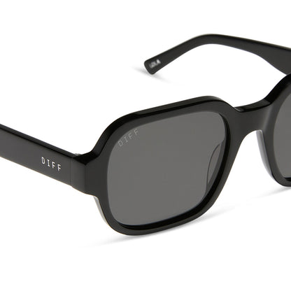 aspyn ovard x diff eyewear featuring the lola square sunglasses with a black frame and grey lenses detailed view