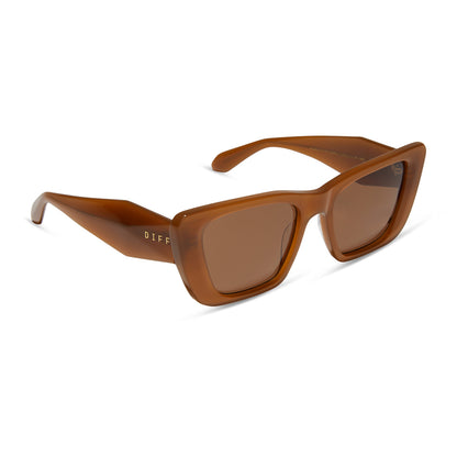 diff eyewear featuring the aura square sunglasses with a salted caramel frame and brown lenses angled view