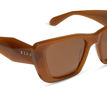 diff eyewear featuring the aura square sunglasses with a salted caramel frame and brown lenses detailed view