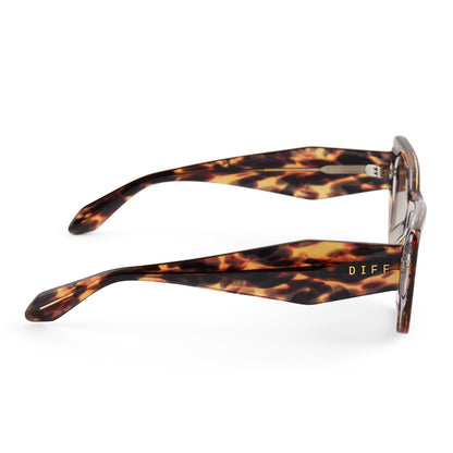 diff eyewear featuring the aura cateye sunglasses with a wild tort frame and brown gradient lenses side view