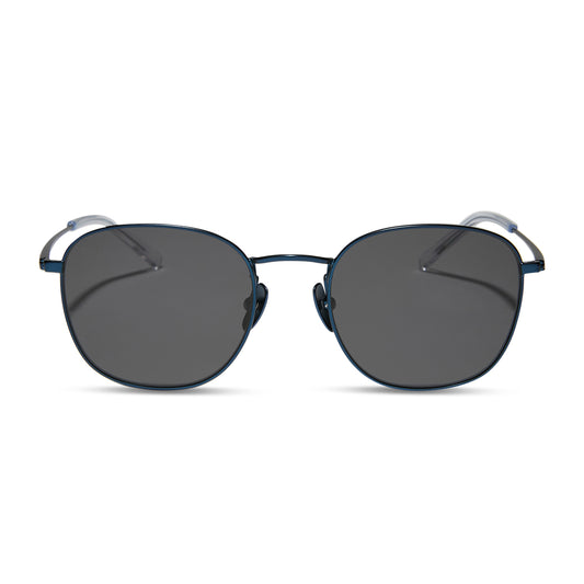 diff eyewear featuring the axel round sunglasses with a deep navy metal frame and grey polarized lenses front view