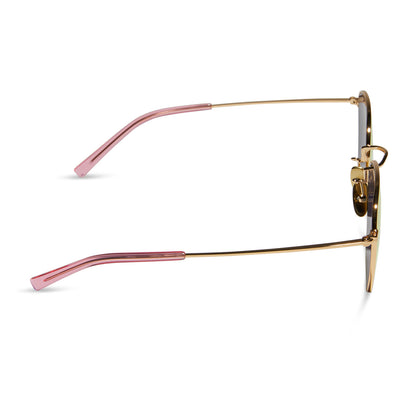 diff eyewear featuring the axel round sunglasses with a gold frame and pink rush mirror lenses side view