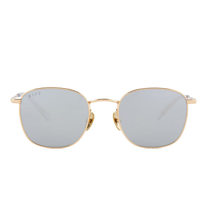 diff eyewear featuring the axel round sunglasses with a gold frame and silver mirror lenses front view