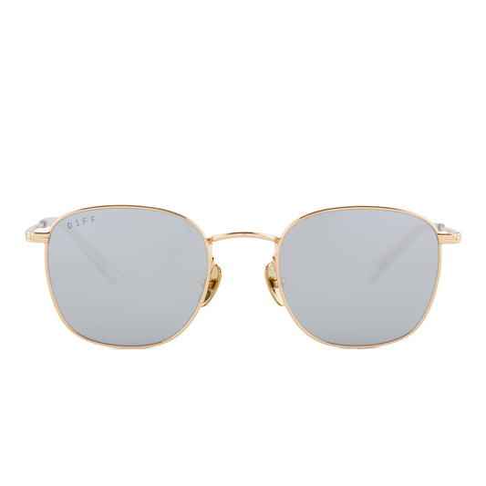 diff eyewear featuring the axel round sunglasses with a gold frame and silver mirror lenses front view