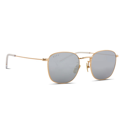 diff eyewear featuring the axel round sunglasses with a gold frame and silver mirror lenses angled view
