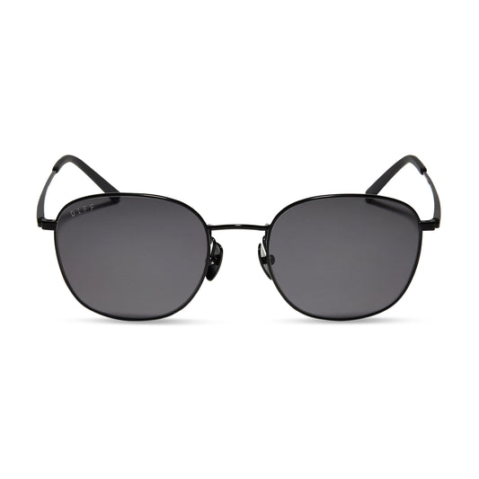 diff eyewear axel round sunglasses with a matte black frame and grey lenses front view