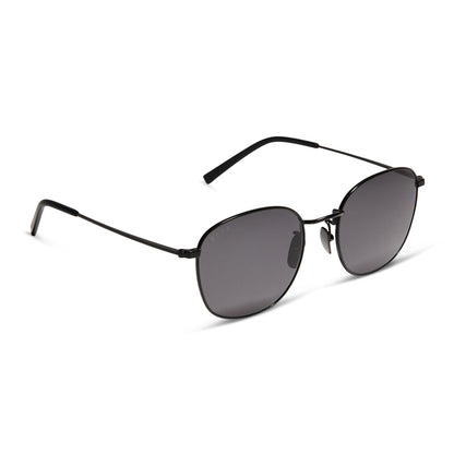 diff eyewear axel round sunglasses with a matte black frame and grey lenses angled view