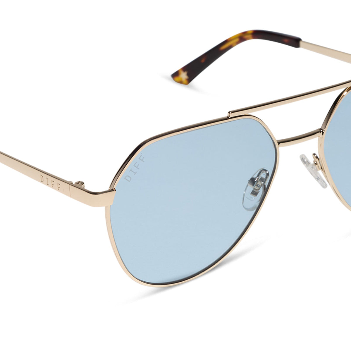 beach riot x diff eyewear the reserve aviator sunglasses with a gold metal frame and blue tint lenses detailed view