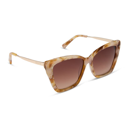 diff eyewear becky ii cat eye sunglasses with a gilded tortoise and gold metal frame with brown gradient lenses angled view