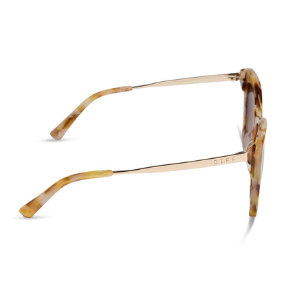 diff eyewear becky ii cat eye sunglasses with a gilded tortoise and gold metal frame with brown gradient lenses side view