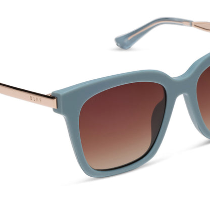 diff eyewear bella square oversized sunglasses with a dew drop blue frame, gold temples and brown gradient lenses detailed view