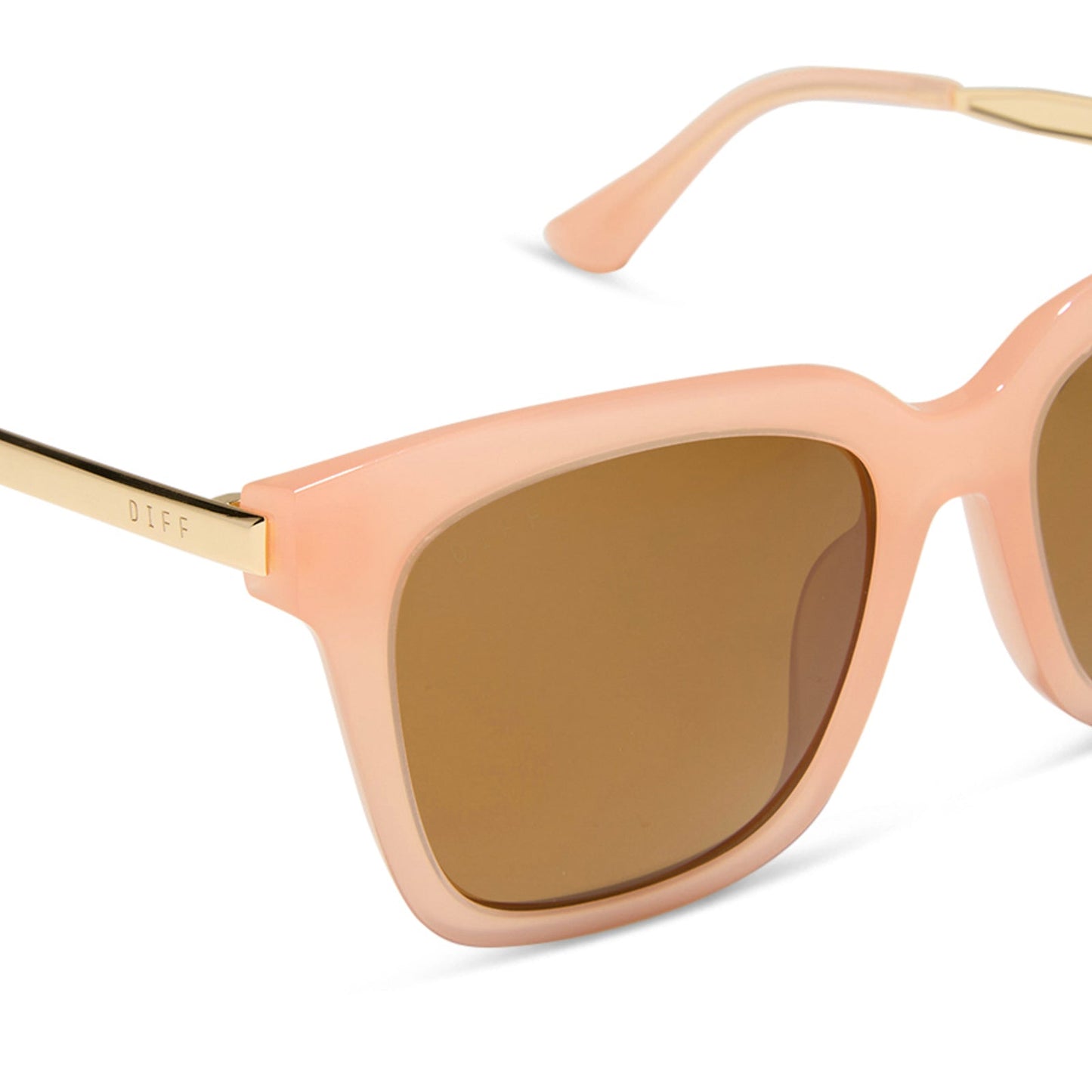diff eyewear featuring the bella square sunglasses with a peach frame and brown polarized lenses detailed view