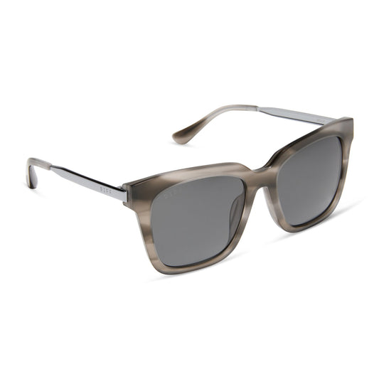 diff eyewear featuring the bella square sunglasses with a smoke marble frame and grey polarized lenses angled view