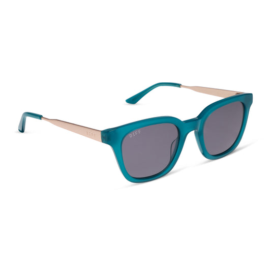 diff eyewear featuring the bridget round sunglasses with a dark teal frame and grey lenses angled view