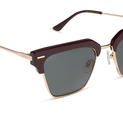 diff eyewear featuring the capri rectangle sunglasses with a dark cherry lacquer frame and grey polarized lenses detailed view