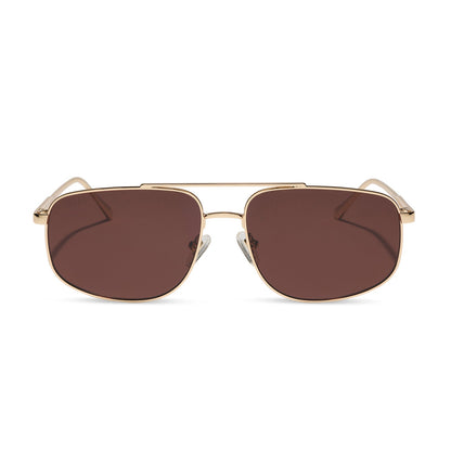 diff eyewear featuring the charley navigator sunglasses with a gold metal frame and brown polarized lenses front view