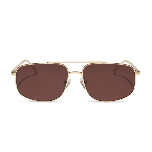 diff eyewear featuring the charley navigator sunglasses with a gold metal frame and brown polarized lenses front view