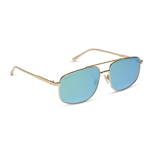 diff eyewear charley navigator sunglasses with a gold metal frame and dew drop blue mirrored lenses angled view