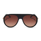 diff eyewear cleo oversized aviator sunglasses with a black frame, gold temples and brown gradient lenses front view