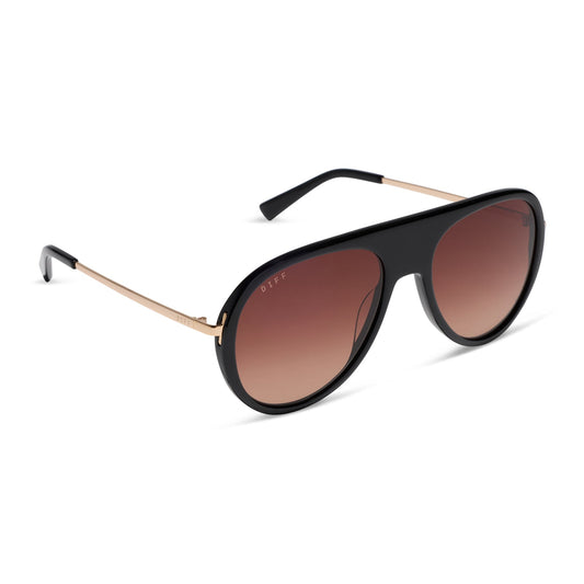 diff eyewear cleo oversized aviator sunglasses with a black frame, gold temples and brown gradient lenses angled view