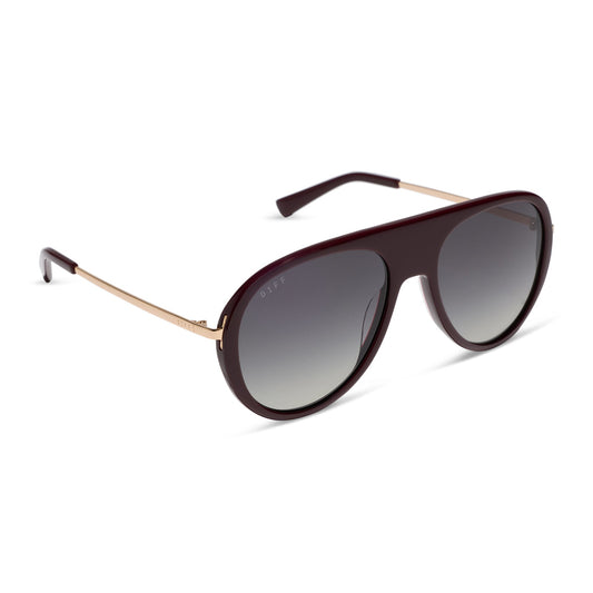 diff eyewear cleo oversized aviator sunglasses with a dark cherry lacquer red frame, gold temples and grey gradient polarized lenses angled view