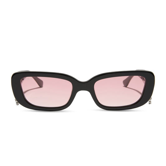 clueless x diff eyewear featuring the cher round sunglasses with a black frame and pink gradient lenses front view