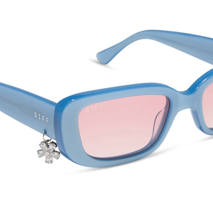 clueless x diff eyewear featuring the cher round sunglasses with a light blue frame and pink gradient lenses detailed view
