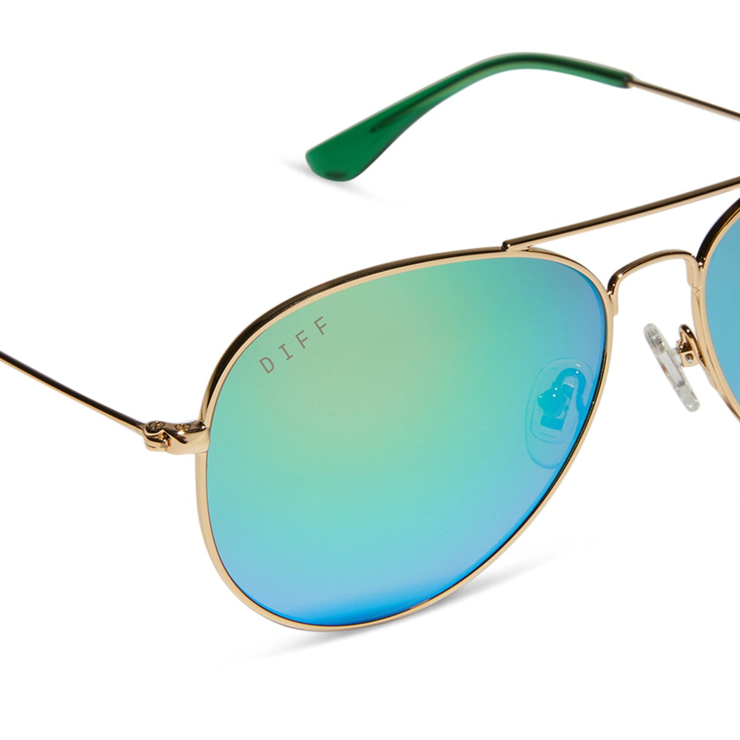 diff eyewear cruz aviator sunglasses with a gold metal frame and green mirror polarized lenses detailed view