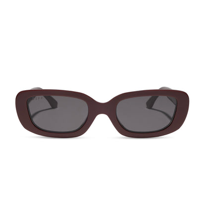 diff eyewear featuring the daphne rectangle sunglasses with a rugby red acetate frame and grey polarized lenses front view