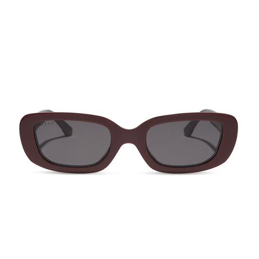 diff eyewear featuring the daphne rectangle sunglasses with a rugby red acetate frame and grey polarized lenses front view