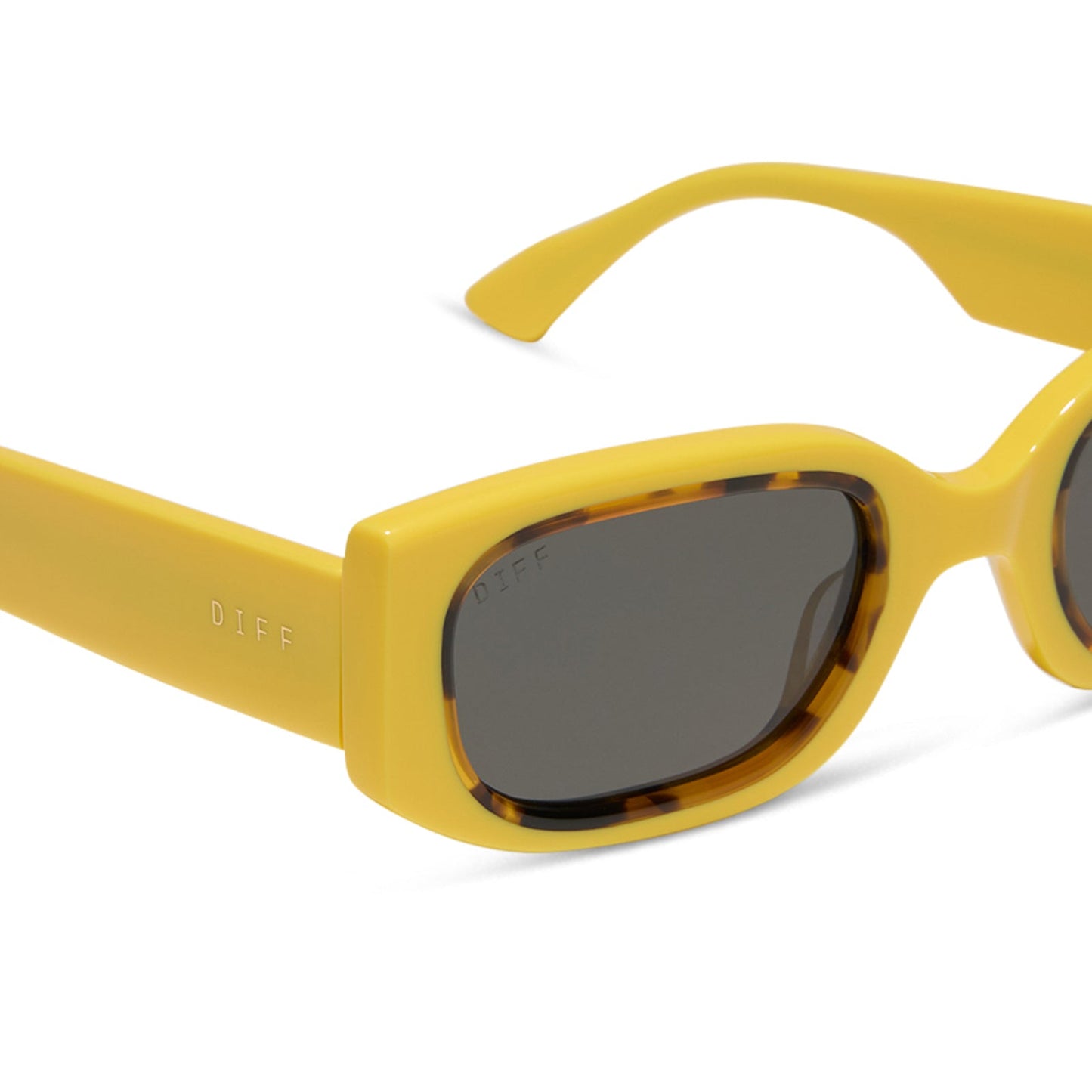 emily in paris x diff eyewear featuring the julien 2.0 rectangle sunglasses with a citron yellow with tortoise frame and chic grey lenses detailed view