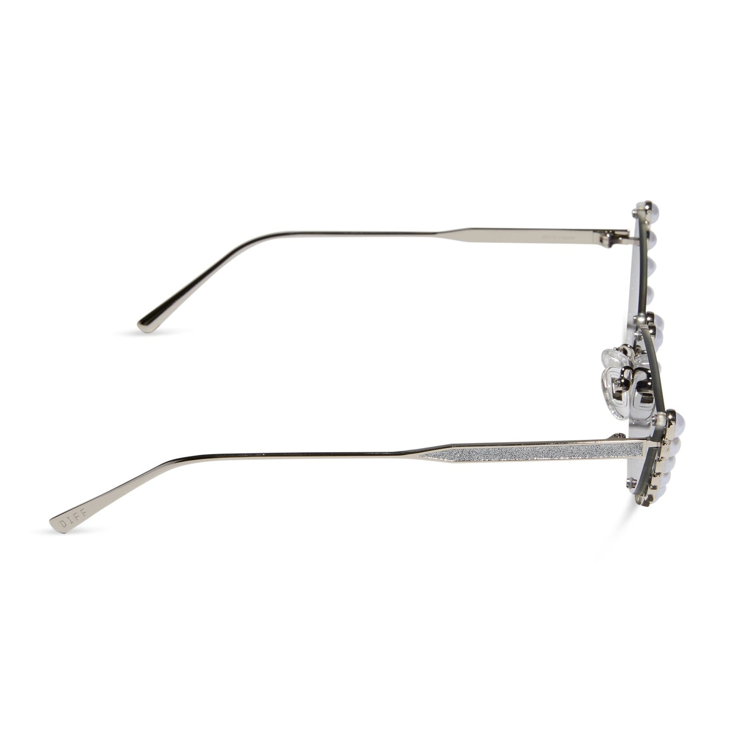 emily in paris x diff eyewear featuring the mindy 2.0 cateye sunglasses with a champagne pearl frame and grey gradient lenses side view