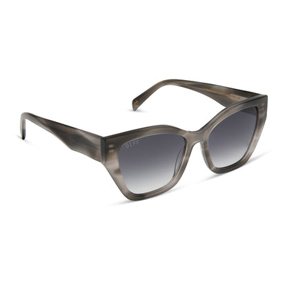 diff eyewear featuring the evie cat eye sunglasses with a smoke marble grey frame and grey gradient lenses angled view