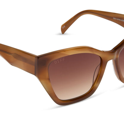 diff eyewear featuring the evie cat eye sunglasses with a tawny brown tortoise frame and brown gradient lenses detailed view