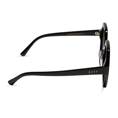 diff eyewear gigi sunglasses with a black frame and grey flash lenses side view